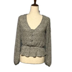 Sienna Sky Cream & Black Animal Print Peplum Top XS